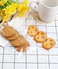 300 Count 4x6 Inch Self Adhesive Cellophane Bags 2.8 Mil Clear Plastic Bags with Cookies and Pretzels Displayed