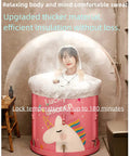 Woman in portable folding bathtub with quick open design, featuring unicorn decal, lightweight and no install needed.