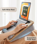 Portable Laptop Lap Desk With Pillow Cushion, Fits Up To 15.6 Inch Laptops, Anti Slip Strip shown with laptop in use on couch