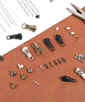 48 Piece Zipper Repair Kit With Metal Sliders And Pulls For Jackets Backpacks Tents And Luggage displayed on a surface
