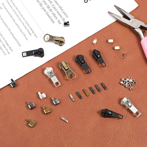 48 Piece Zipper Repair Kit With Metal Sliders And Pulls For Jackets Backpacks Tents And Luggage displayed on a surface