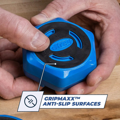 Multipurpose Project Blocks Set Four Hexagon Woodworking Blocks with GripMaxx surface in hand view, blue and black anti-slip design