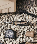 Built Tough Multi Bit Screwdriver Featuring Double Sided Magnetized Tips And Ergonomic MOA Grip on gravel with tools.