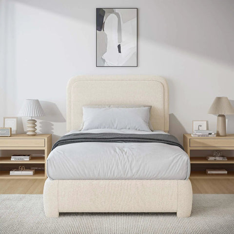Snug Twin Bed Frame With Ultra Soft Cloud Boucle Fabric And Cream Upholstered Headboard Featuring Smooth Rounded Corners For A Lowkey Luxe Bedroom Setup That Definitely Checks Out in a cozy room setting.