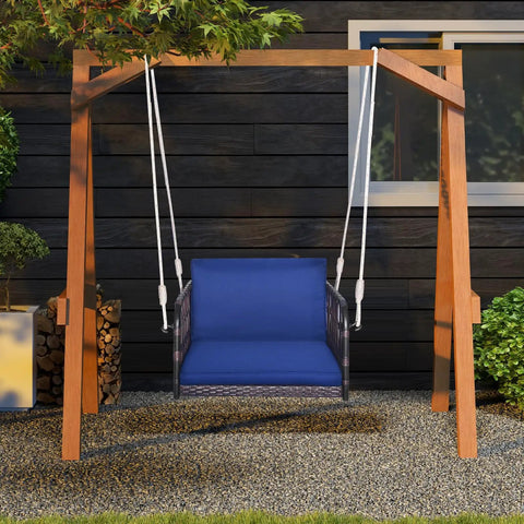 Cozy Navy Rattan Patio Swing Chair For One With Cushions, Heavy Duty Metal Frame And Sturdy Hanging Ropes in a garden setup