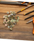 50 Pack Hella Tough U Shape Nut Fasteners For Automotive Body Clips Heavy Duty Metal used for auto trim mounting on wood background.