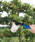 Manual Pollinator Tool Powder Dispenser Puffer Sprayer For Fruit Trees And Garden 500 Ml Capacity in use on apple tree