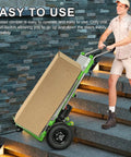 Huge 1200w Electric Stair Climbing Hand Truck For Moving Heavy Loads Like Fridges Furniture And Water Heaters Up To 880 Lbs One Go Save Your Back Tired? in use on stairs with a box.