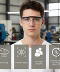 Man wearing Four Pack Safety Glasses Set With Clear Anti Fog Lenses For Men And Women, shown in an industrial workshop setting.