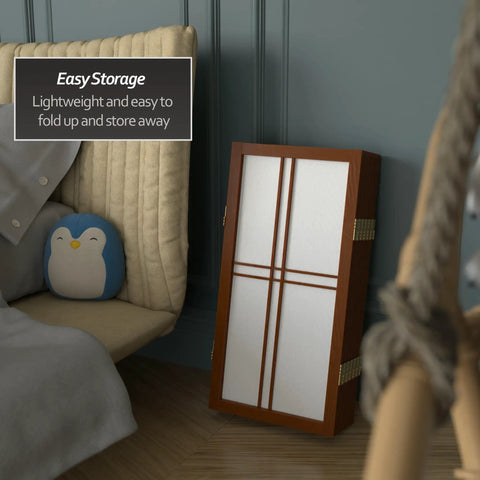 Grab-And-Go Walnut 2 Ft Desktop Double Cross Shoji Screen folded next to chair, 6-panel privacy divider with rice paper