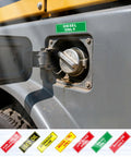 Close-up of diesel fuel cap with green 'DIESEL ONLY' sticker, featuring 9 Pack Hydraulic Fluid Stickers 6x2 Inch Waterproof Decals.