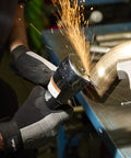 Person using Air Cut Off Tool Pro Grade Heavy Duty 20000 RPM Pneumatic Type 41 to cut metal in workshop