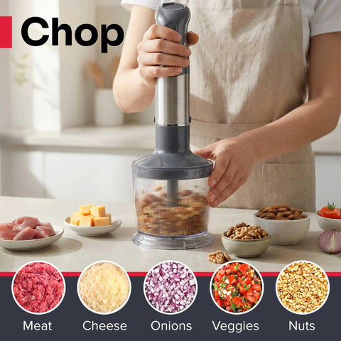 Person using Boss 5 In 1 Immersion Hand Blender Set With 800W Copper Motor And Titanium Reinforced Blades to chop nuts