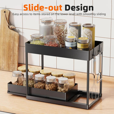 Smooth Pullout Under Sink Organizer Two Pack Heavy Duty Metal Rack For Kitchen And Bathroom Big Stack Zero Clutter Solid Setup Storage Game Changer In Black with jars and utensils.