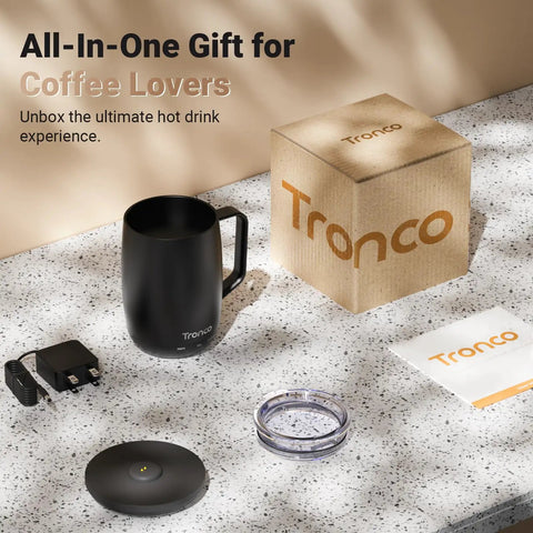 No App Hassle Self Heating Coffee Mug With Precise Temperature Control, 14 Oz Travel Cup displayed with charger and packaging.