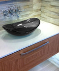 Clear Grey Bigio Glass Vessel Bathroom Sink With Above Counter Mount Tempered Glass Scratch Resistant And Non Porous 21.5 By 15 By 5.5 Inches Drain Opening 1.75 Inches Modern Vessel Design on countertop.