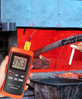 Kiln Temperature Thermometer With K Type Thermocouple And Ceramic Insulator Sensor in use near a hot forge