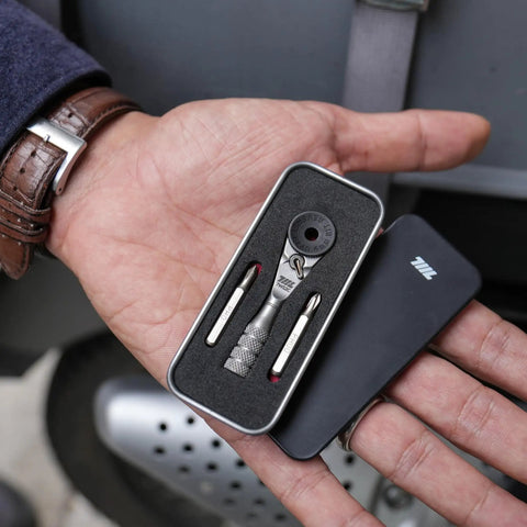 Pocket Size Micro Ratchet Wrench With Knurled Grip 4mm Precision Ratcheting Screwdriver in hand, shown with bits in case