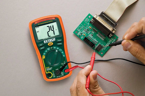Autoranging Mini Multimeter With Built In Non Contact Voltage Detector Handy Tool For Diy And Pros in use with circuit board