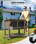 Man pushing 80 Qt Rolling Patio Cooler With Bottle Opener And Shelf For Backyard Hangouts And Gatherings, in Taupe Brown