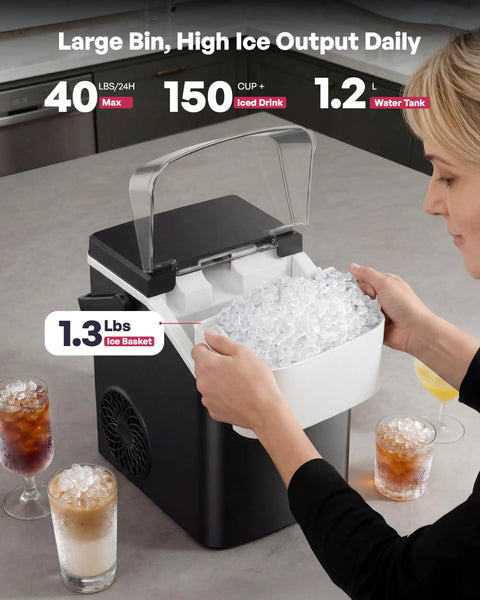 Nugget Ice Maker Countertop With Handle Ready In Four Minutes Produces Up To Forty Pounds Per Day Chewable Sonic Ice Self Cleaning Portable Ice Maker With Basket And Scoop For Home Party RV Camping Black on kitchen counter, ice in basket.