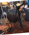 Heavy Duty Alloy Folding Drum Rack With Hinged Height Adjustment Quick Release Clamps Snare Bass Drum Holder in music studio.