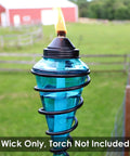Replacement Fiberglass Wicks For Outdoor Tiki Torches And Lamps Eight Pack Fits Any Outdoor Torch Trim To Fit Wicks Half Inch Diameter By Eight Inch Height Long Lasting Flame Keeps Outdoor Nights Lit shown in use in a blue torch