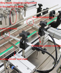 Plug And Play Automatic Liquid Filling Machine With Magnetic Pump And Four Stainless Nozzles Handles Five To One Thousand Milliliter Bottles Fast Rock Solid Ironclad Conveyor Belt Delivers Straight Fire Industrial Efficiency showing nozzle and components.