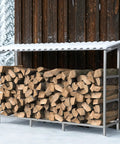Heavy Duty Four Foot Firewood Rack With Weather Cover For Indoor And Outdoor Use Sturdy Metal Wood Storage Stand Keeps Dry Firewood Ready For Fireplace Or Fire Pit outdoors in snow