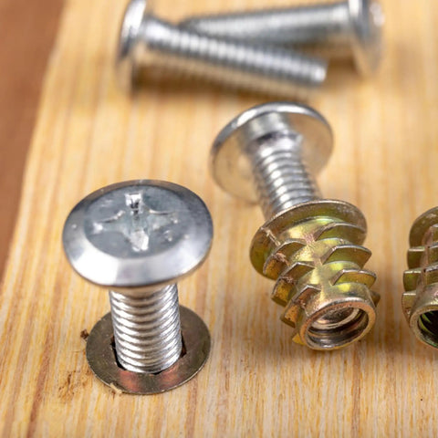 Close-up of metal screws on wood, not related to Ultra Thin M10x16x0.1mm Shim Washers Set