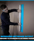 Worker using Pro Series ST QuickSkim Plaster Skimming Blade 23 5 8 Inch Semi Flexible High Grade Plastic Blade With Extruded Aluminum Handle