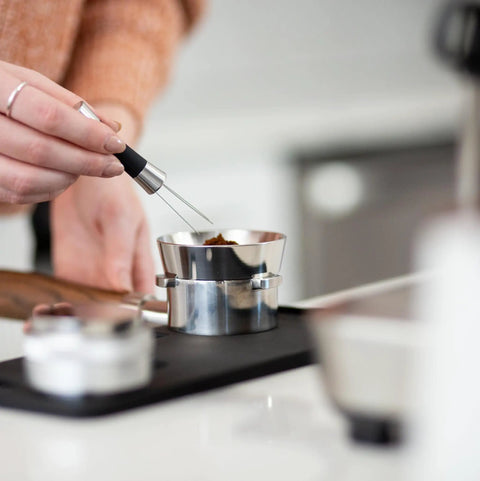 Badass Non Slip Silicone Tamping Mat For Dual Boiler Espresso Machines Includes Vented Drip Tray with espresso gear in use.
