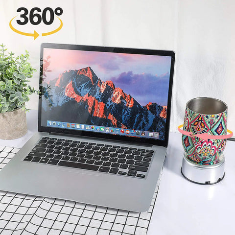 Mudder Silver Rotating Display Turntable Base For Epoxy Tumbler, 360 Degree Electric Spinner With USB Power Cord beside a laptop.