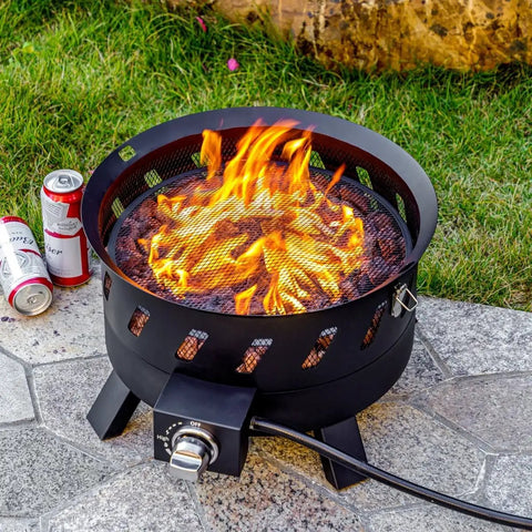 Smokeless Portable Propane Fire Pit For Outdoor Use With Lid And Handle Seventeen Point Three Inch Gas Fire Bowl lit in yard