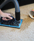 Person using Sub Surface Extraction Tool 71 001 For Carpet Cleaning Odor Elimination And Deep Stain Removal, near spilled coffee cup