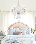Five Light Crystal Pendant Chandelier With Acrylic Beads, Plug In Pendant Lights above a bed in a cozy room setting with clear cord