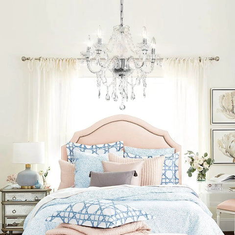 Five Light Crystal Pendant Chandelier With Acrylic Beads, Plug In Pendant Lights above a bed in a cozy room setting with clear cord