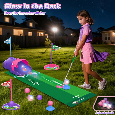 Child playing with Kids Golf Toy Set With Dinosaur Automatic Ball Return LED Light Up Night Balls 3 Clubs Putting Mat