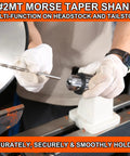 Hands holding a drill bit and a Heavy Duty 1/2 Inch Keyed Drill Chuck With Two Morse Taper Arbor for wood lathe use.