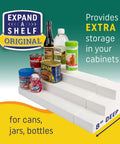 3 Tier Expandable Cabinet Shelf Organizer Knockout Storage Hack Heavy Duty Build holds cans and jars on smooth white surface
