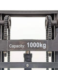 Heavy Duty Electric Thin Leg Pallet Stacker As A No Fuss Heavy Hitter With 2204 Lb Load Capacity and 130 Inch Lift Height showing 1000kg capacity sign and chain drive.