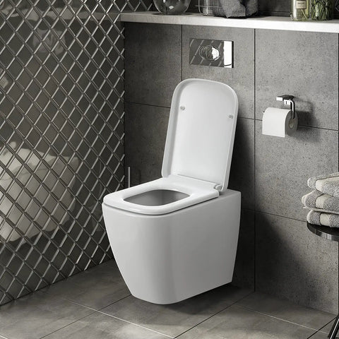 Square Modern Toilet Seat Featuring Whisper Quiet Soft Close Hinges Sturdy Polypropylene Shell Provides A Straight Up Hassle Free Swap And Delivers Silky Smooth Closures With Zero Drama Or Noise in a modern bathroom setting.
