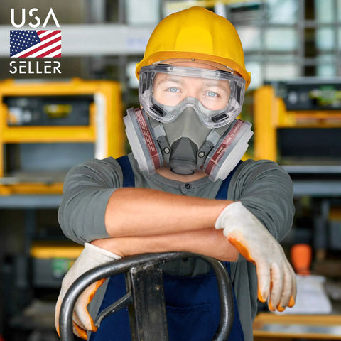 Worker wearing yellow hard hat and respirator mask with 8-Pack Replacement Carbon Filters For Respirator Masks in workshop.