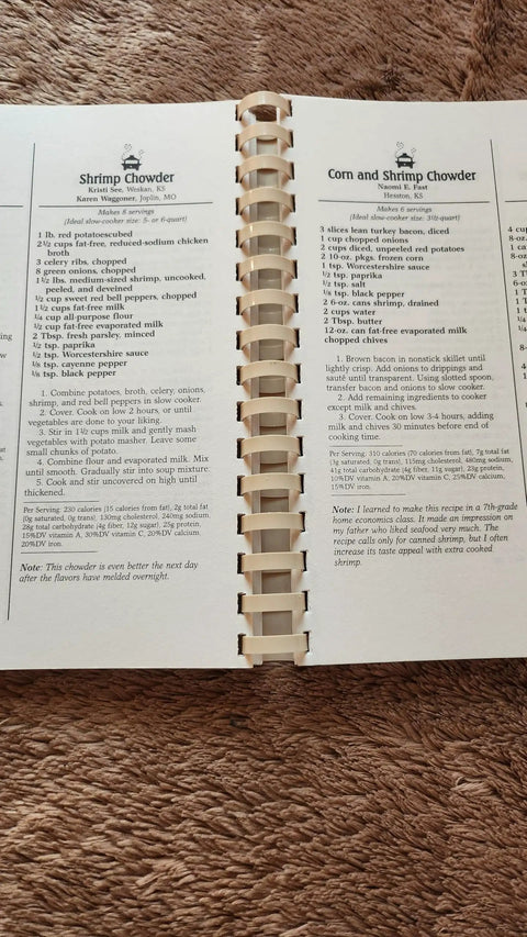 The Award Winning Healthy Low Fat Slow Cooker Cookbook For Quick Easy Family Dinners And Hella Tasty No Fuss Meal Prep Systems Pure Everyday Kitchen Game Changer Manual open to recipes for Shrimp Chowder and Corn and Shrimp Chowder.