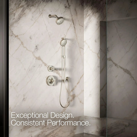 Purist Four Function Handheld Showerhead With Nonpositive Shutoff Full Coverage Spray Pulsating Massage And Silk Spray 1.75 GPM Flow Vibrant Brushed Nickel Finish Built For Easy Daily Showers mounted on marble wall