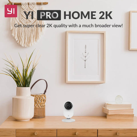 Two Pack Smart Home Camera System With 1080p WiFi Indoor Surveillance AI Human Detection Pet Monitor on a wooden shelf.