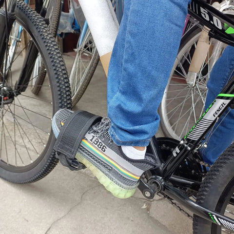 Cyclist using One Pair Bike Pedal Straps Toe Clips with Adjustable Grippy Anti Slip Tape on mountain bike pedal