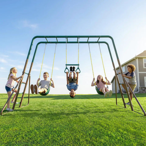 Kids playing on Backyard Swing Set Built Tough With Monkey Bars Trapeze Bar And Two Belt Swings Heavy Duty Metal Playground In Green And Brown