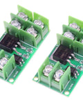 Isolated MOSFET Switch Module Pack Of 2 with high low level trigger for DC control 5 to 36V output and 3 to 24V input shown in green circuit boards