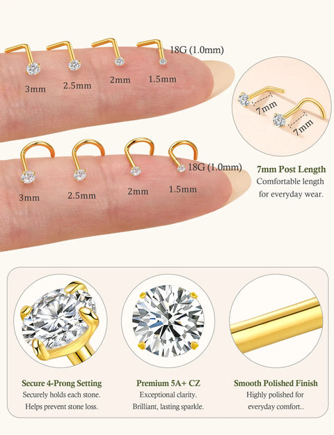 Fire Upgraded 18G Titanium Gold Nose Studs And Corkscrew Piercing Rings showing different sizes of jewelry on a fingertip.